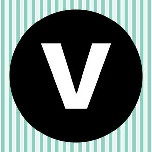 Image of a white letter V inside of a black circle with a teal and white striped background.