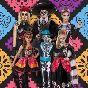 Image of 3 adults and 3 kids wearing different Day of the Dead inspired costumes.