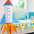 Image of a space themed party set up with space and alien party supplies.