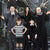 Image of 5 people wearing different The Addams Family character costumes.
