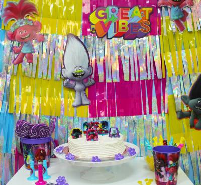 Image of Trolls Theme Party Supplies on Table