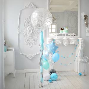 Image of balloons with tassels and string