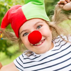 Image of a girl wearing a clown nose