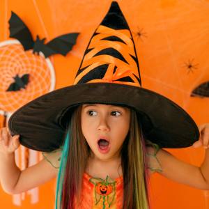 Image of a girl wearing a witch hat