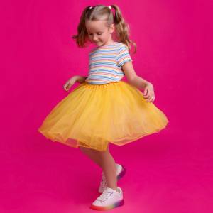 Image of a girl in an orange petticoat