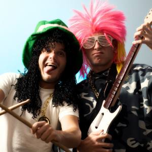 Image of men in costume wigs