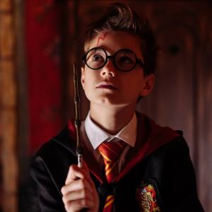 Image of a boy in a Harry Potter costume