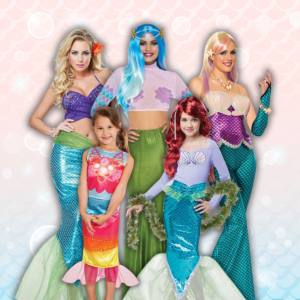 Image of women and girls in mermaid costumes