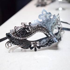 Image of a metal black and silver masquerade mask with rhinestones