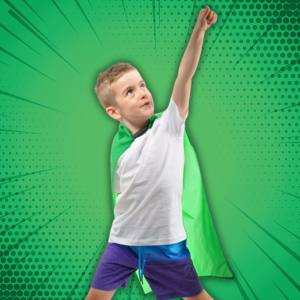 Image of a boy wearing a green cape