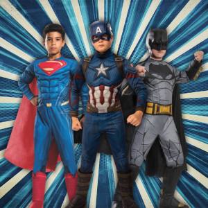 Image of boys in superhero costumes