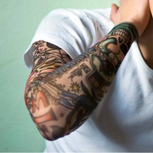 Image of a man with a fake tattoo sleeve