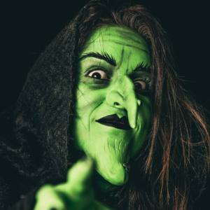 Image of a woman with witch makeup on