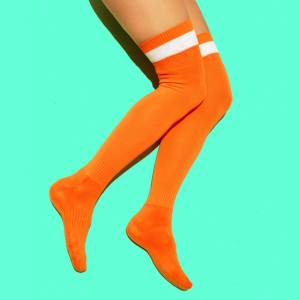 Image of a woman wearing orange knee high socks