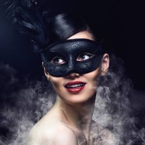 Image of a woman wearing a masquerade mask