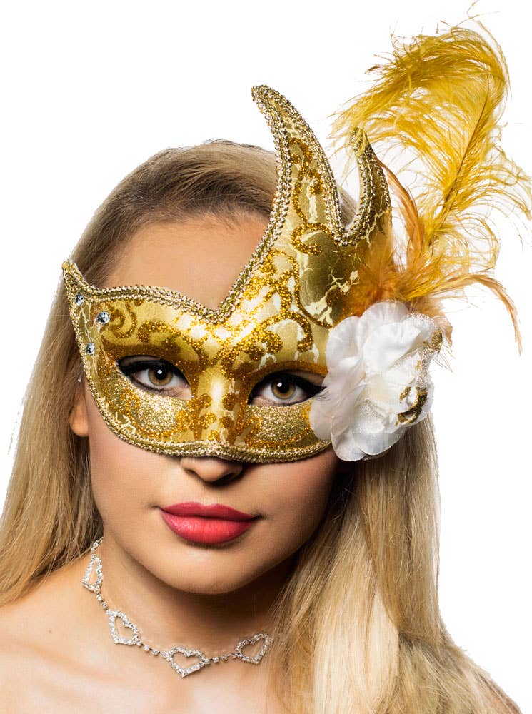 Jewelled Gold Women's Luxury Masquerade Mask with a Side Flower and Feathers