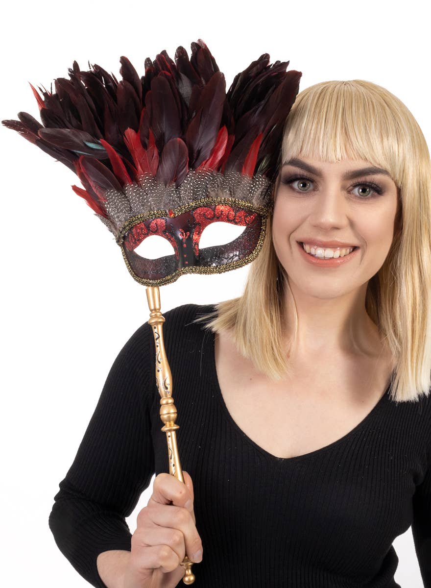 Hand Held Red and Gold Half Face Masquerade Mask with Feathers - Alternative Image