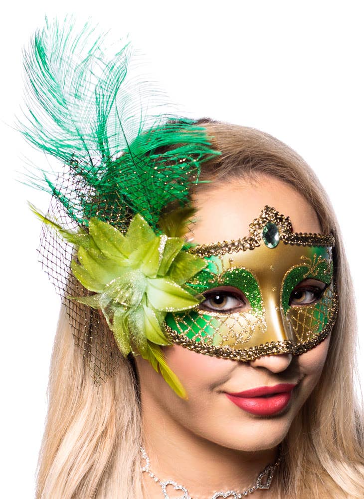 Green Victorian Masquerade Mask with a Flower and Feathers Side View