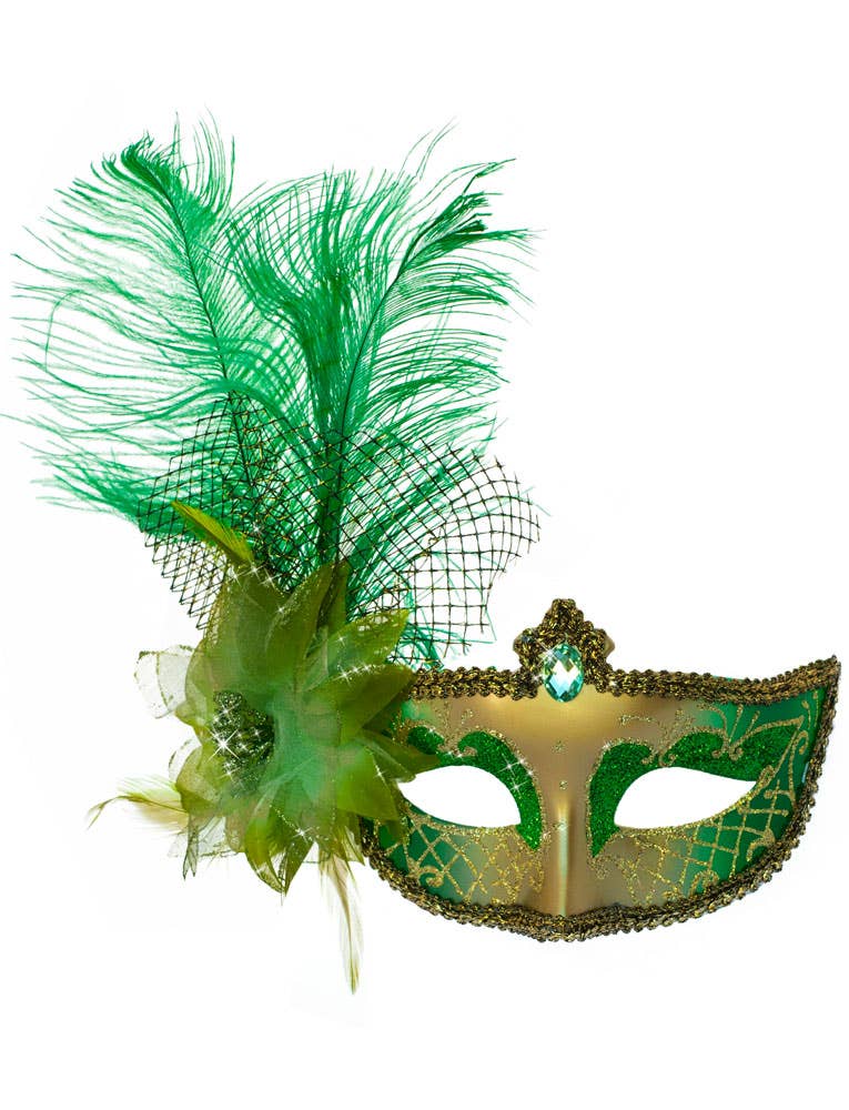Green Victorian Masquerade Mask with a Flower and Feathers Close Up