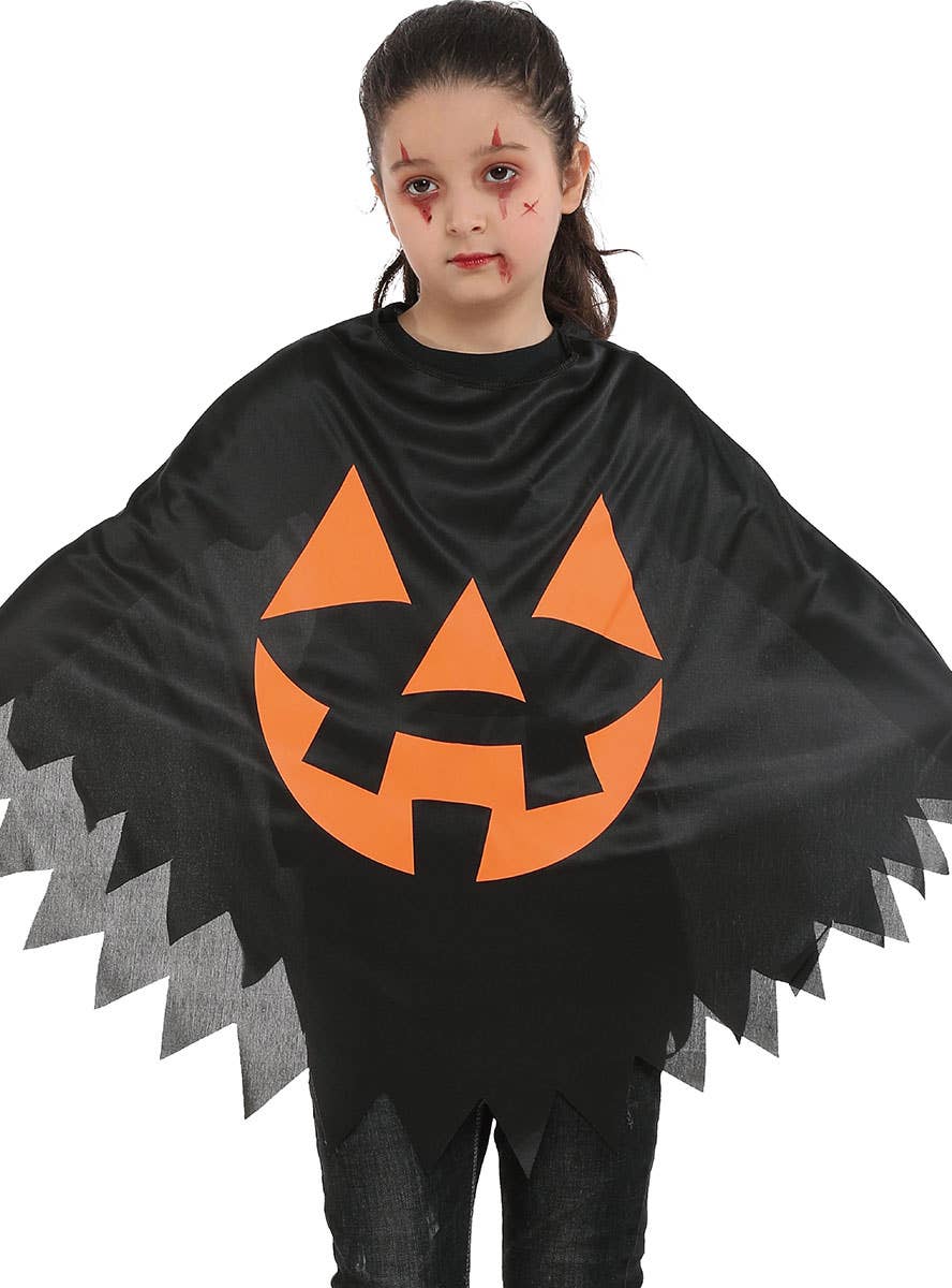 Image of Jack O Lantern Print Girl's Halloween Costume Poncho - Close Image