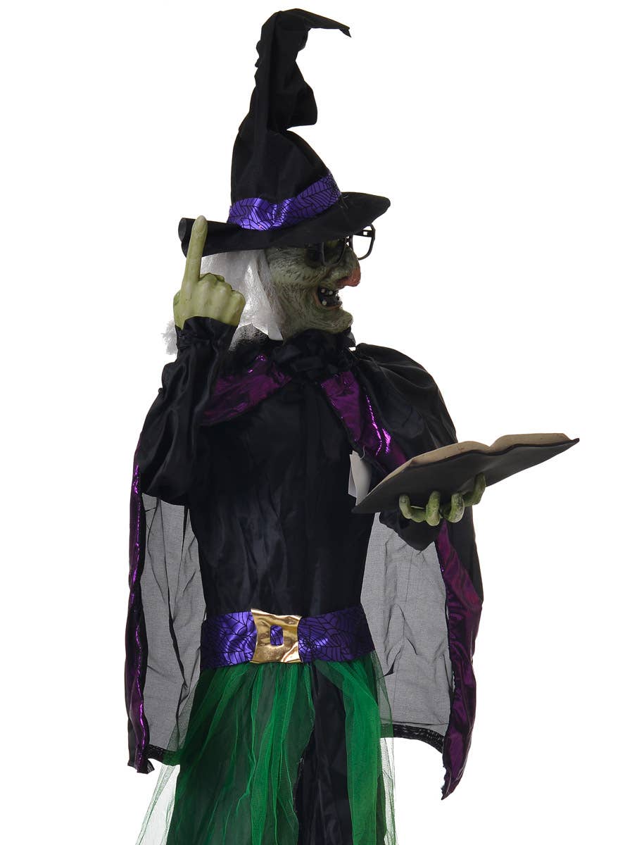 Life Size Animated Witch Holding Spell Book Halloween Decoration with Lights and Sounds - Close Side Image