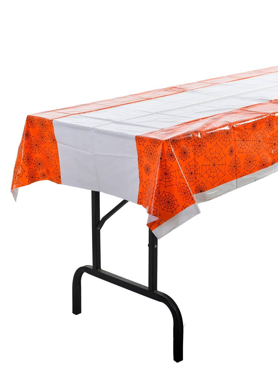 Image of Plastic Orange and White Web Pattern Halloween Table Cover