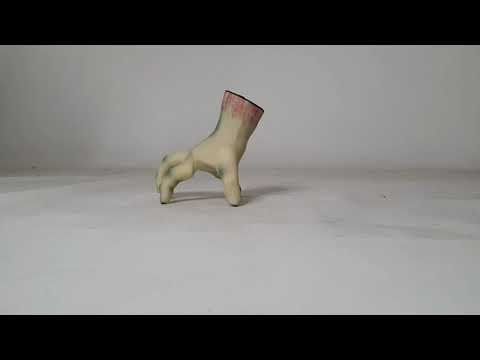 A video showing this animated walking hand Halloween decoration in action.