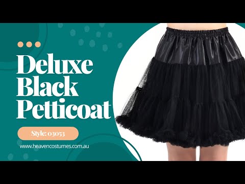 A person modelling this women's black thigh-length petticoat skirt.