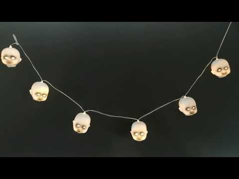 A video showing this doll head garland Halloween decoration lighting up.