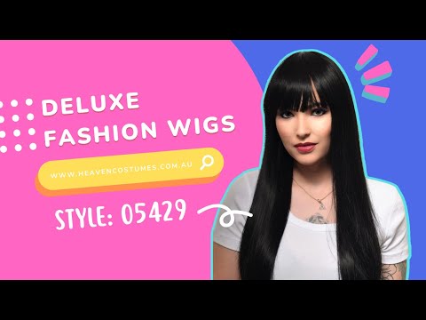 A person modelling this long black costume wig with bangs.