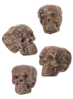 Aged Mini Plastic Skulls in Pack of 4