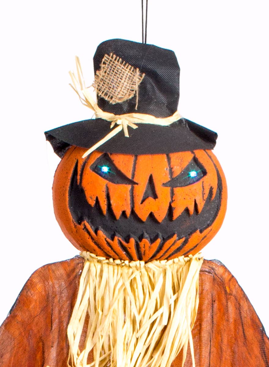 Orange Scarecrow Pumpkin with Light Up Eyes - Close Up