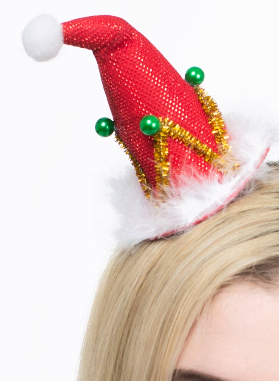 Mini Red Santa Hat on Headband with Fur Trim Close Image